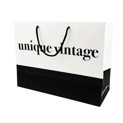 Tote กระดาษกระเป๋าช้อปปิ้ง กระเป๋าตราเงินที่มีมือสําหรับเสื้อผ้า
